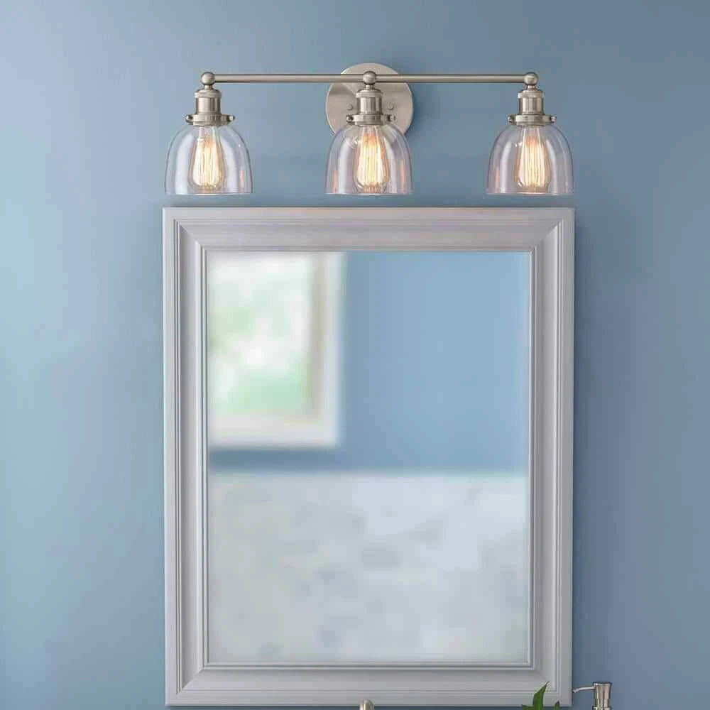 Home Decorators Collection 1004 693 671 | Evelyn 26.75 in. 3-Light Brushed Nickel Vanity Light with Clear Glass Shades