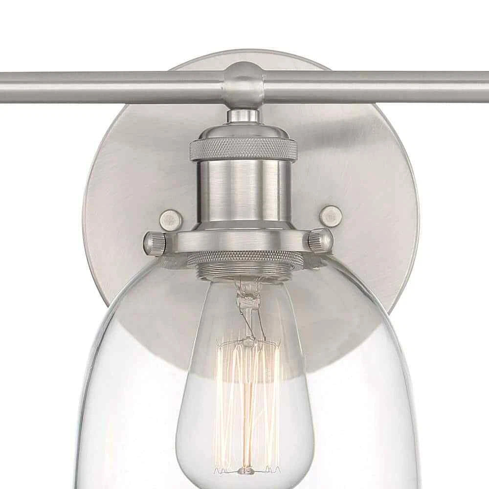 Home Decorators Collection 1004 693 671 | Evelyn 26.75 in. 3-Light Brushed Nickel Vanity Light with Clear Glass Shades