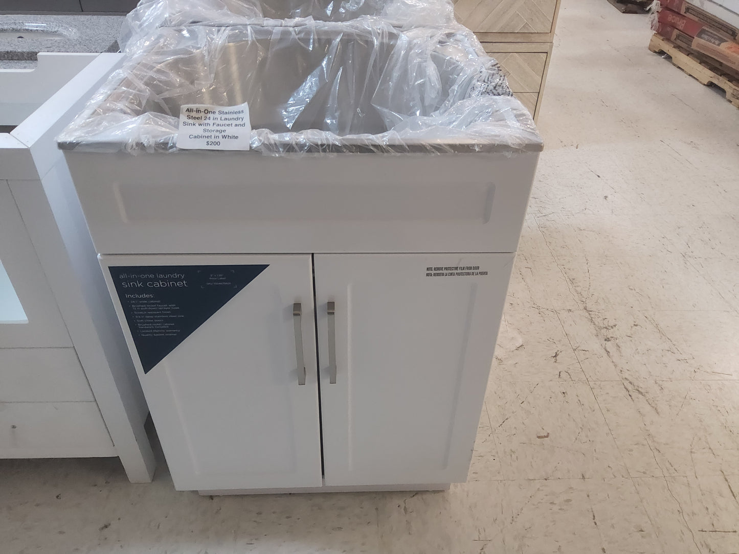 24" All-in one Laundry sink with faucet and storage cabinet in white TOP INCLUDED: $200
776541209
