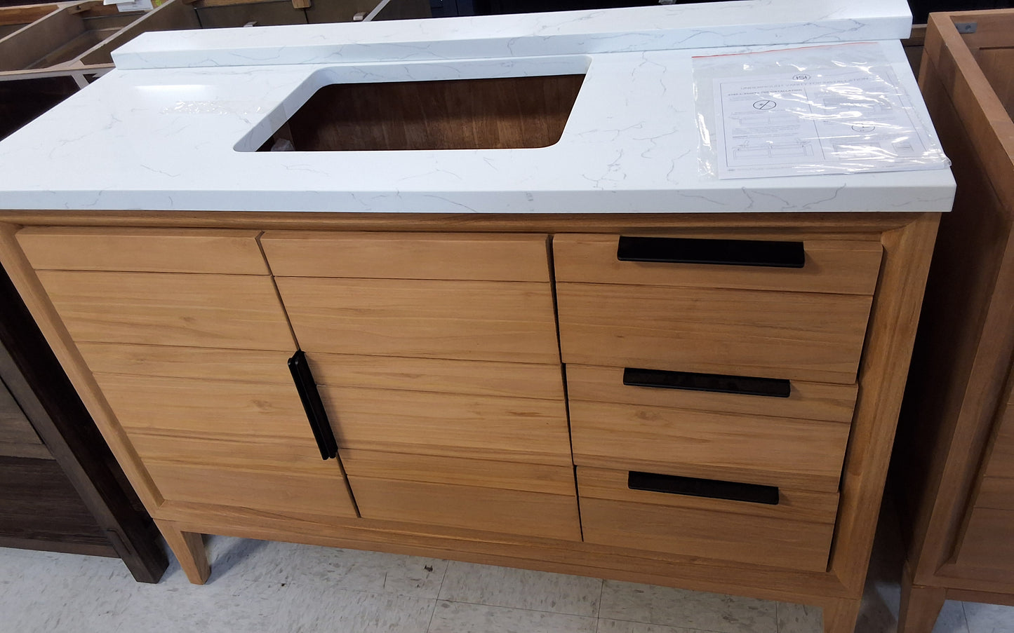 48" Vanity in Light Brown. Top Includeed: $1,100 No Top: $800 99753288