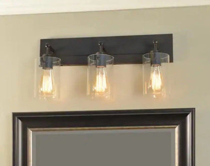 Hampton Bay 1004 335 702 | Regan 21 in. 3-Light Espresso Bronze Vanity Light with Clear Glass Shades