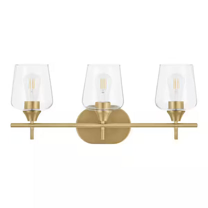 Hampton Bay 1006808031 | Pavlen 24 in. 3-Lights Antique Brass Vanity Light with Clear Glass Shades