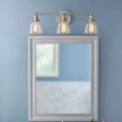 Home Decorators Collection 1004 693 671 | Evelyn 26.75 in. 3-Light Brushed Nickel Vanity Light with Clear Glass Shades