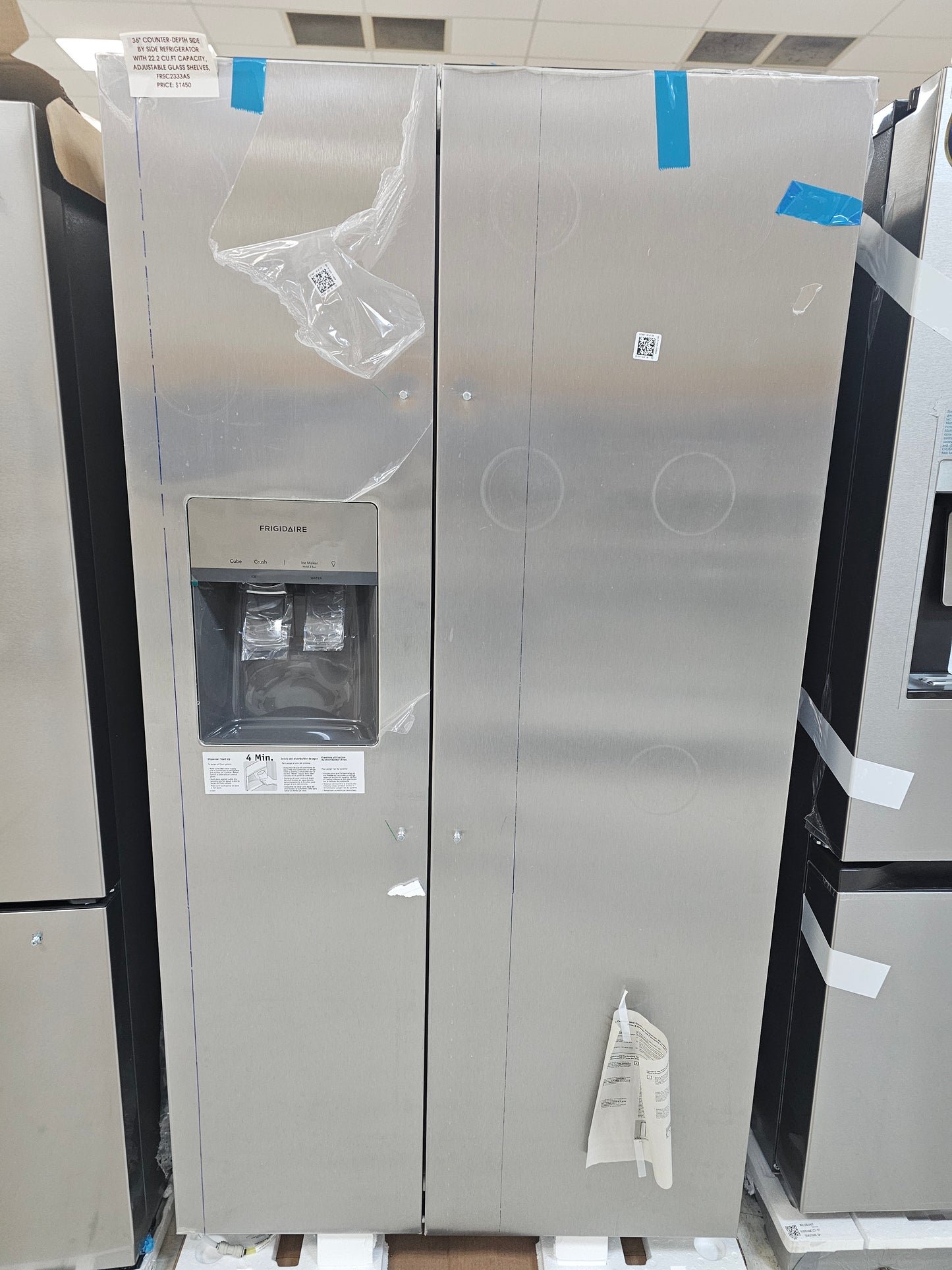 New With Warranty 36" COUNTER-DEPTH SIDE BY SIDE REFRIGERATOR WITH 22.2 CU.FT CAPACITY, ADJUSTABLE GLASS SHELVES, FRSC2333AS